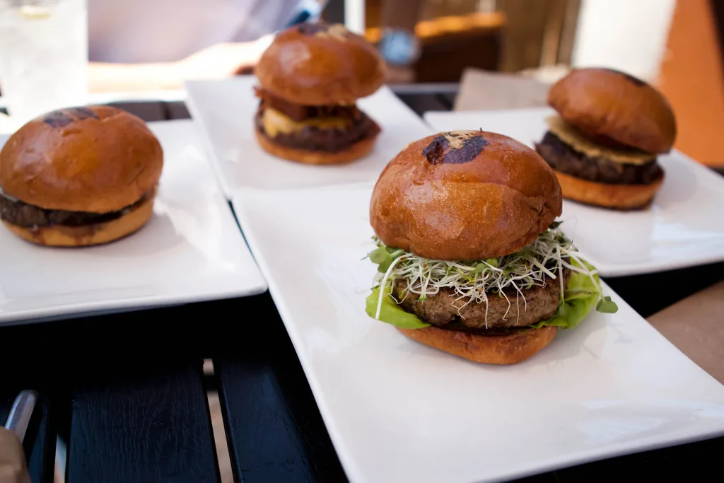 Umami burgers on white plates