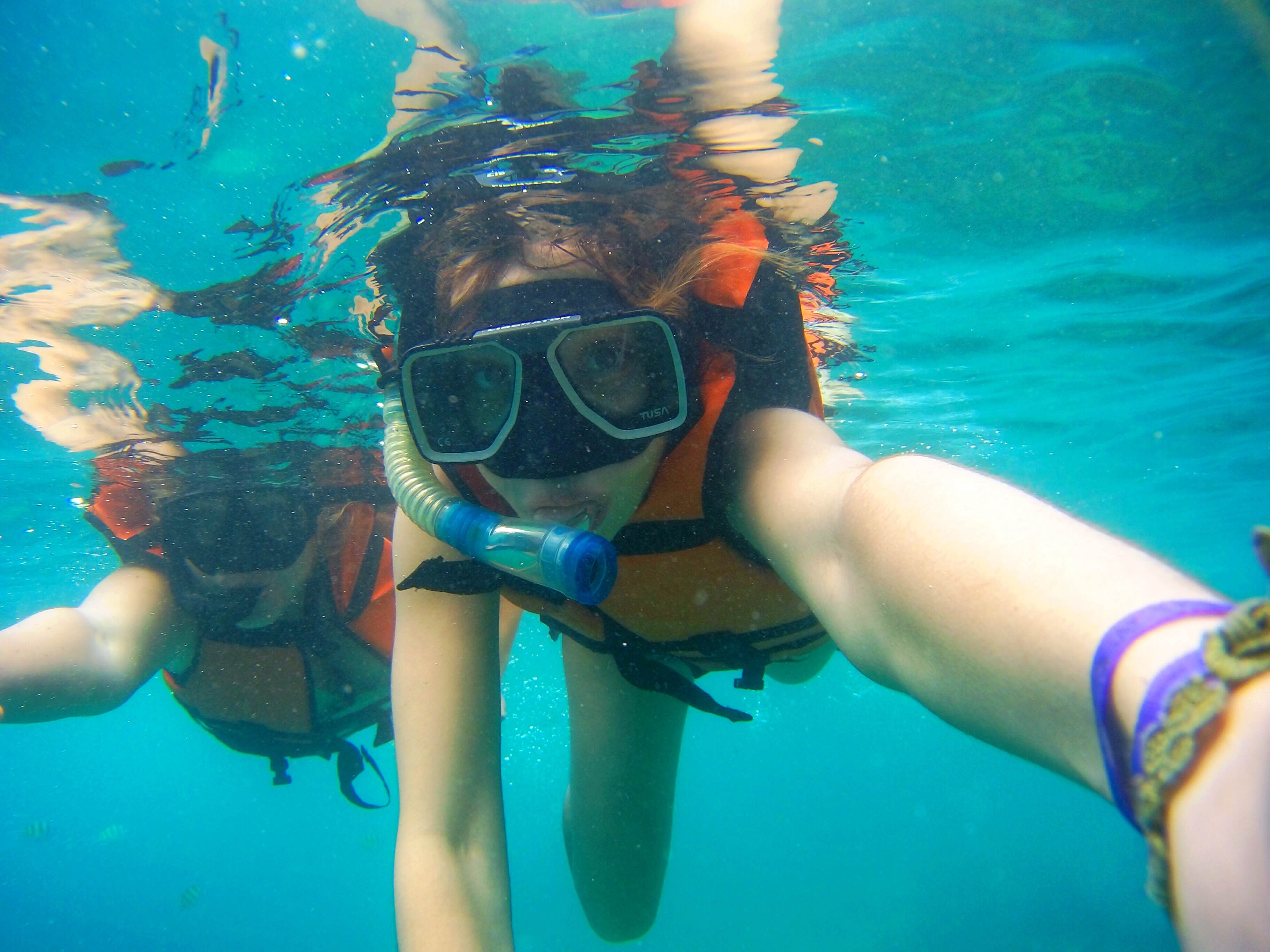 photo of a couple snorkeling in Playa del Carmen