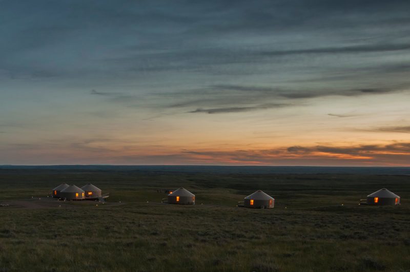 glamping tents at dusk