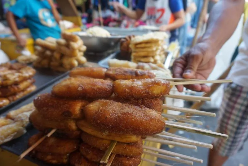 Caramelized banana on sticks in a food market in Cebu