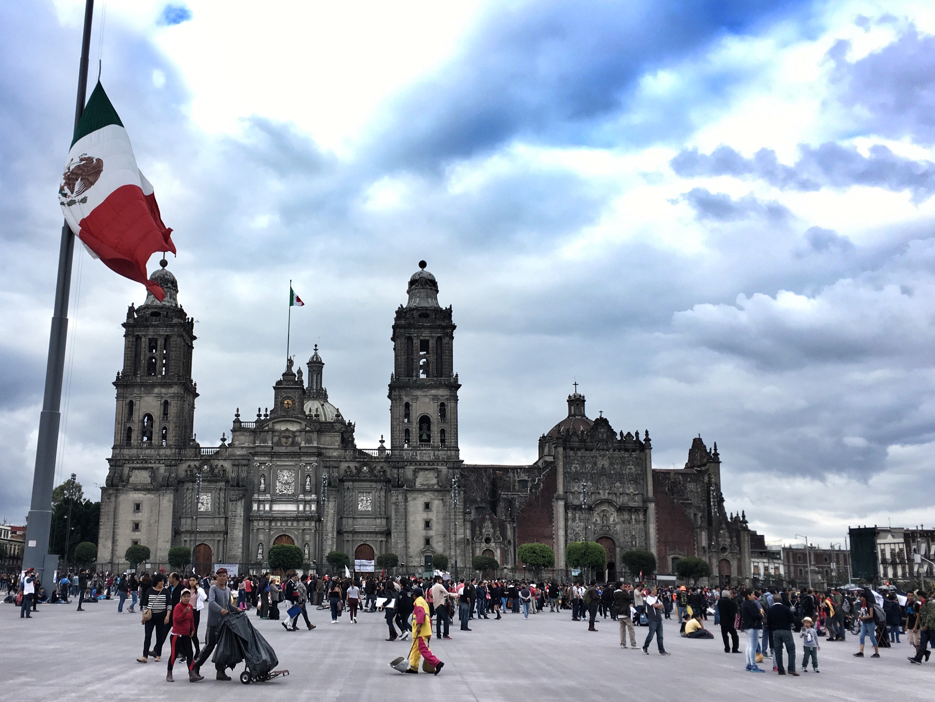 Image of the Zocalo in Mexico City, with people walking around