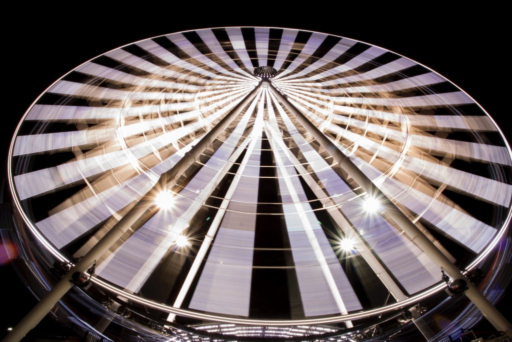 A ferris wheel spinning