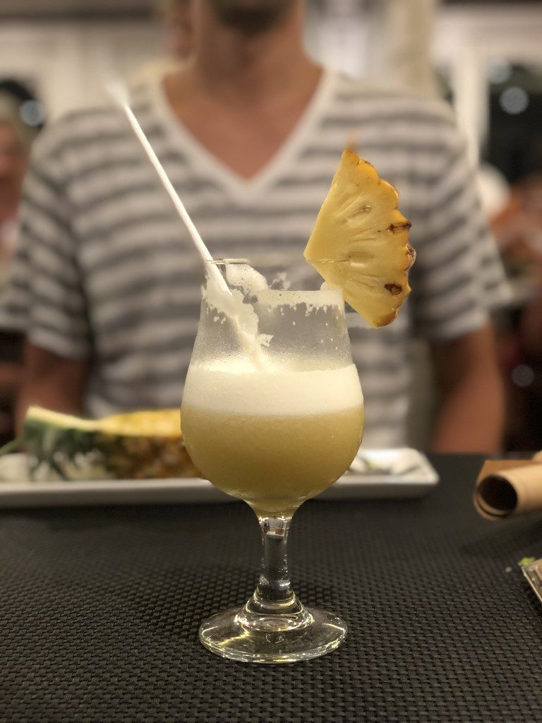 A glass of pina colada