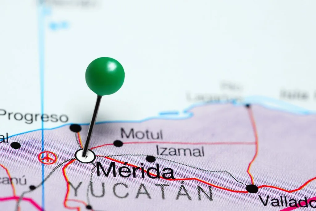 A green pin pointing to Merida, Mexico on a map