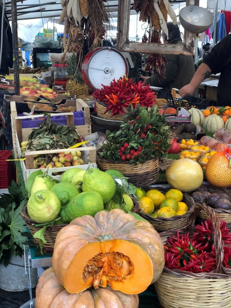 Vegetables and fruits in various baskets in the market of Campo de' Fiori 