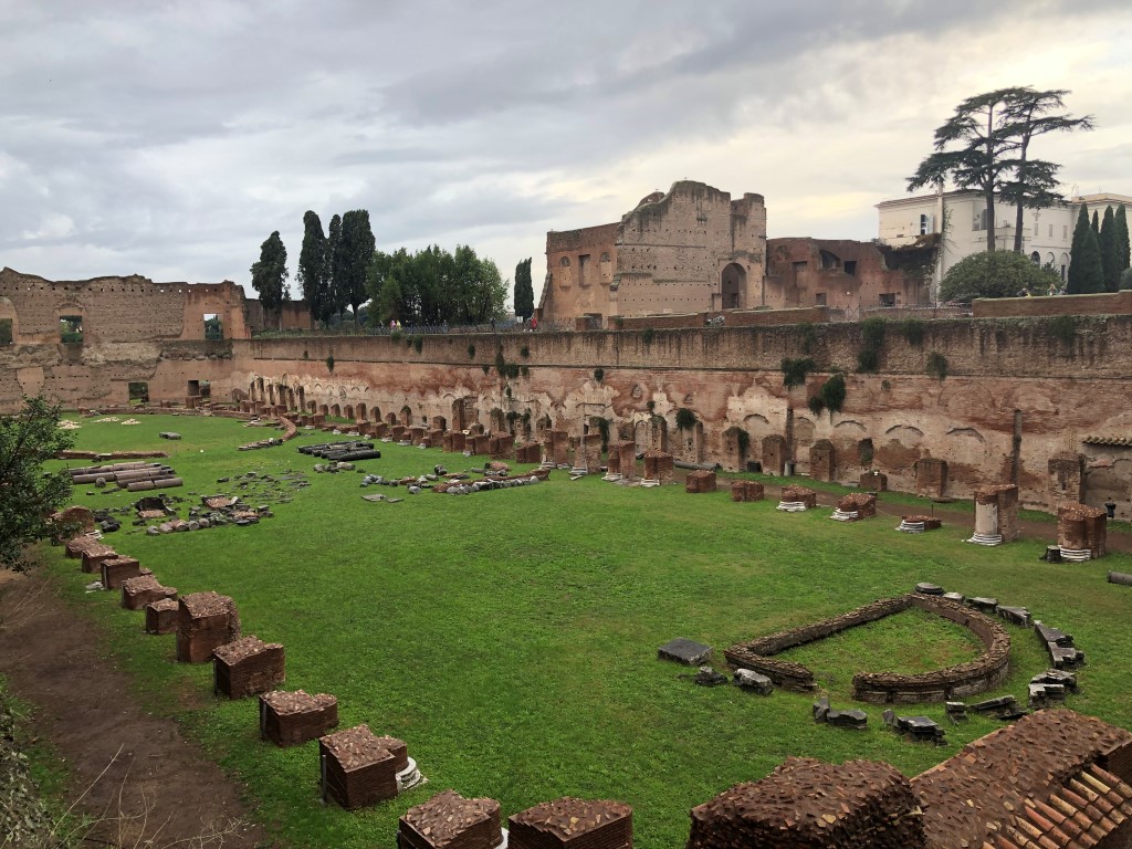 Structures laid around a green area in Palatine Hill 