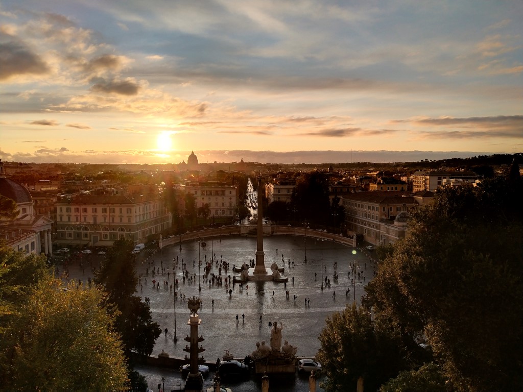 A sunset view of Piazza del Popolo and the historic center of Rome from Pincio Hill 