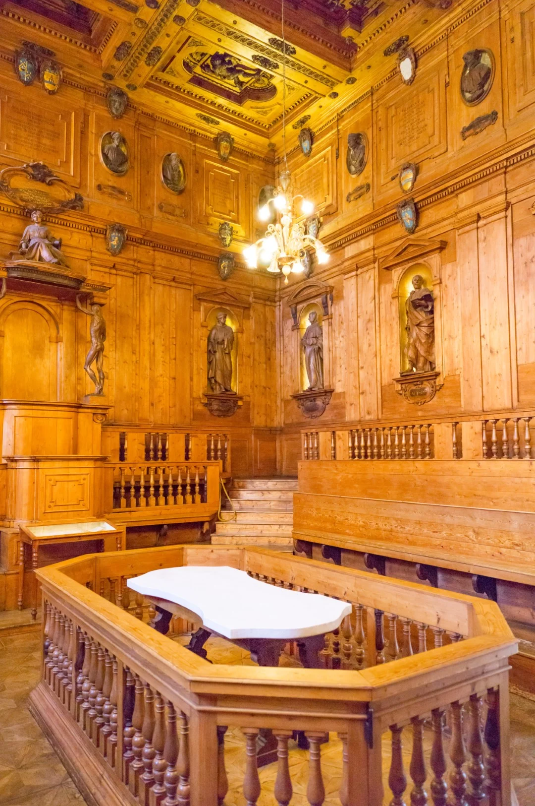 The beautiful interior of the Archiginnasio, one of the buildings of the University of Bologna