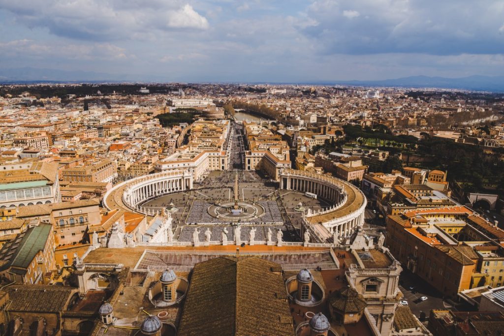 Image of Piazza San Pietro, the Obelisk, and Rome in the distance, seen from St. Peter's Dome, one of the best views in Rome