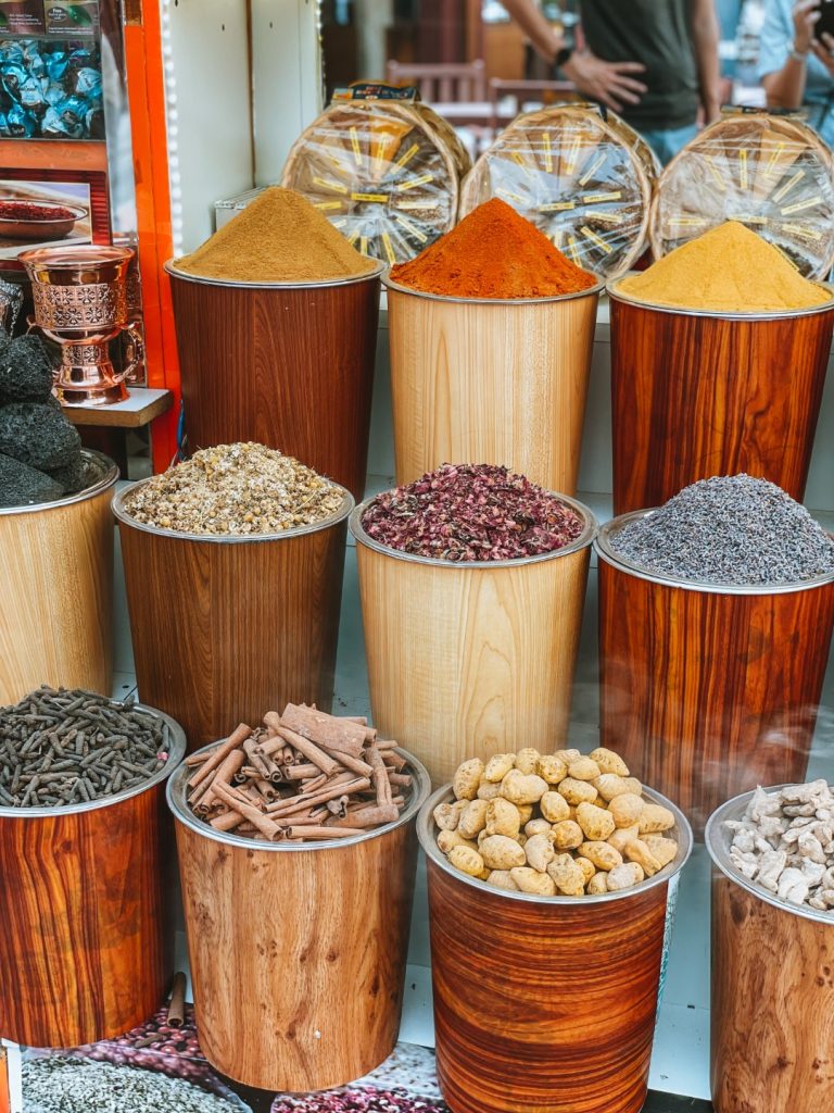 Buckets with spices in a traditional bazaar