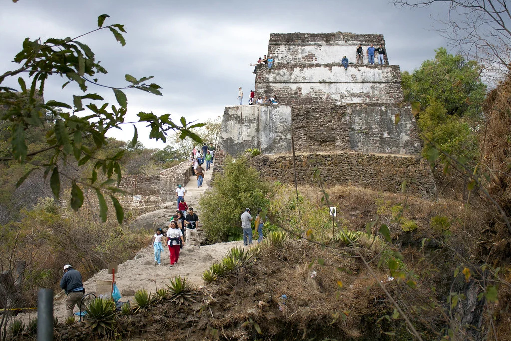 An Aztec pyramid surrounded by vegetation in Tepoztlan (El Tepozteco)