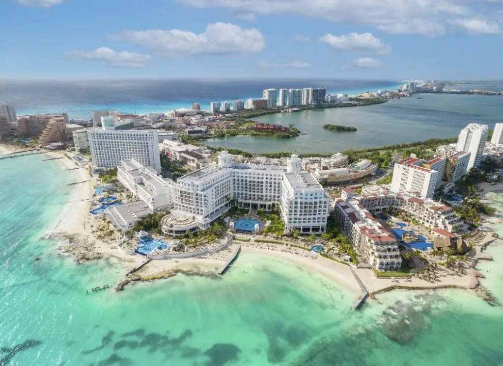 Drone image of Cancun Hotel Zone, with beachfront resorts and turquoise waters