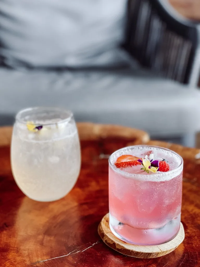 Two drinks set on a table, inserted in a post about a review of Wyndham Alltra Cancun