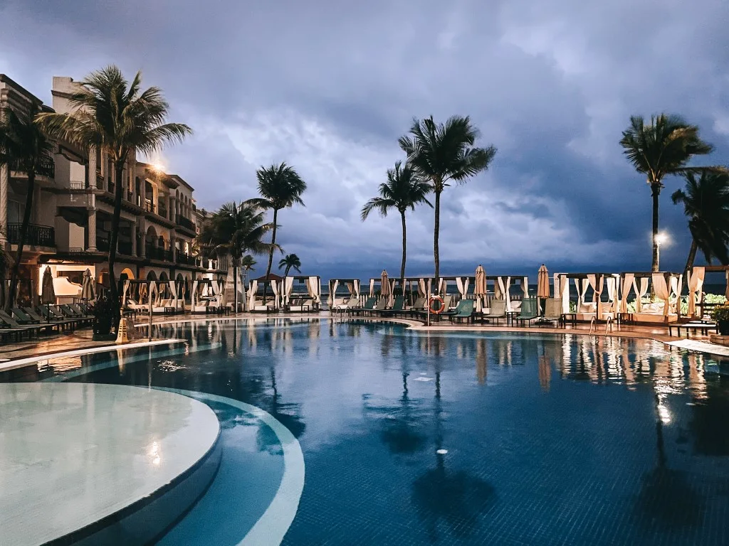 A hotel's pool at night 