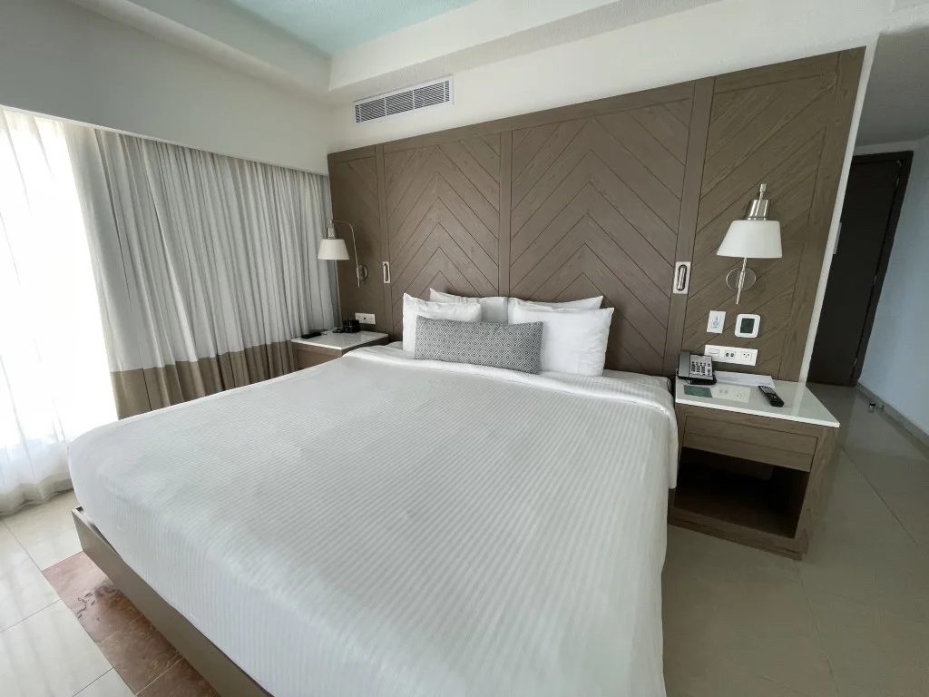 A double bed  in a room at Wyndham Alltra Cancun resort