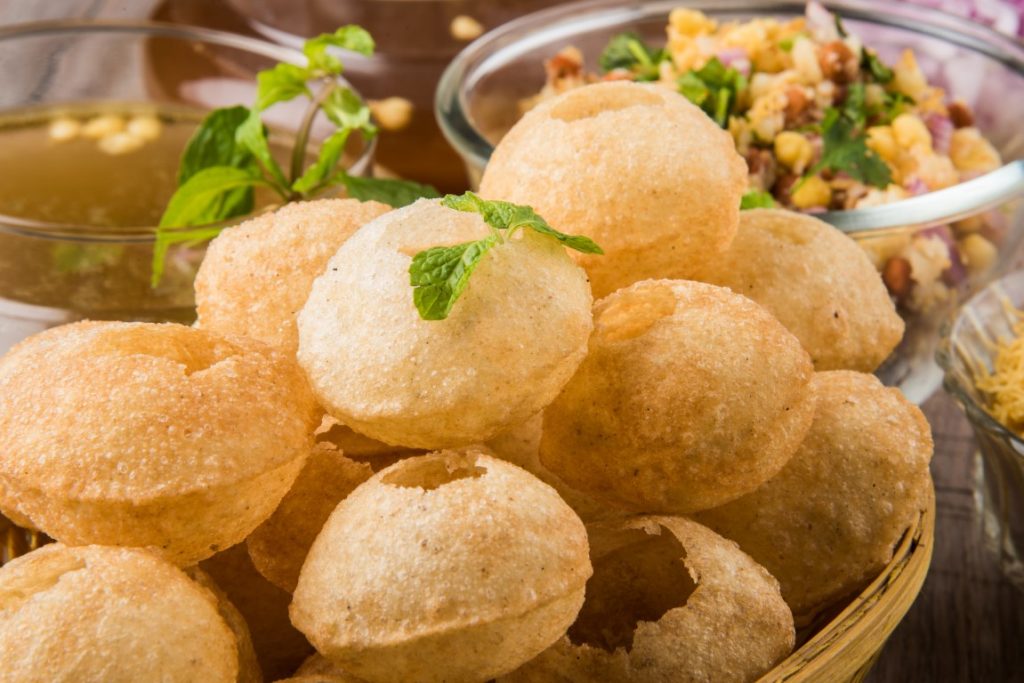 A bowl of pani puri 