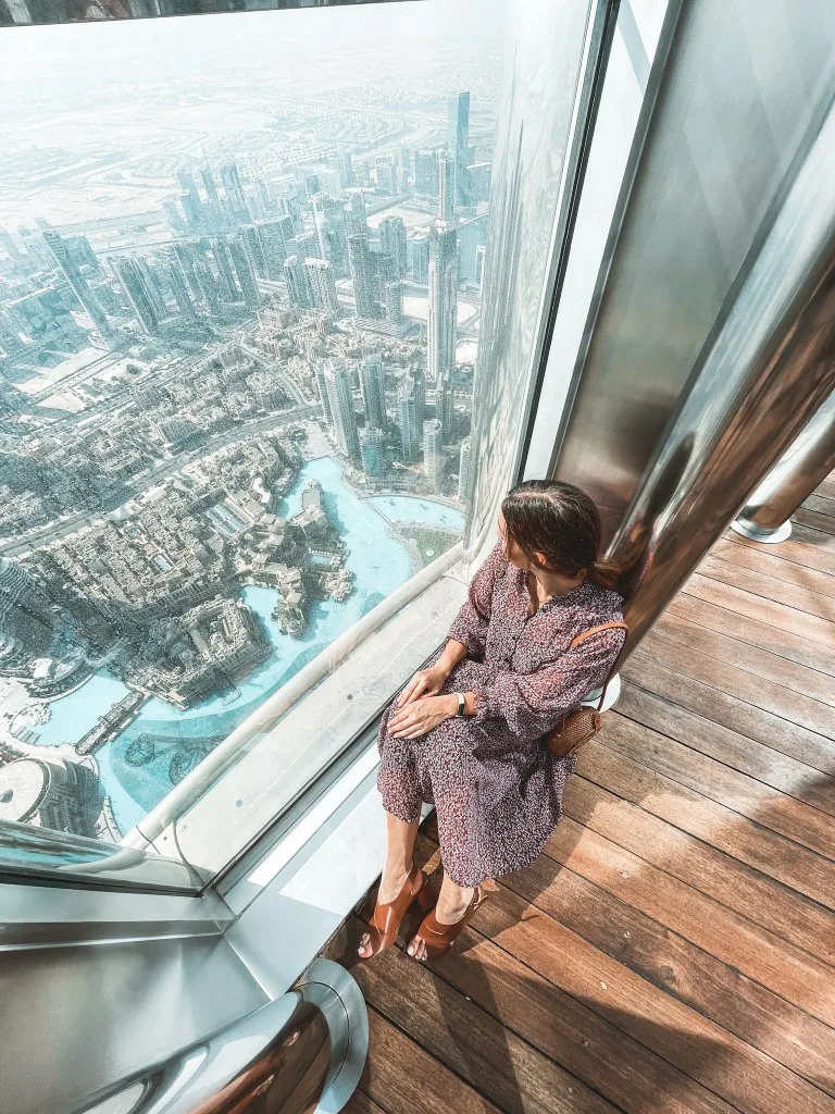 Buy Dubai A lady poses for a photograph at the observation deck of worlds  tallest building Burj Khalifa during sunrise in Dubai United Arab Emirates  UAE on Sept 30 2018 Photo IANS