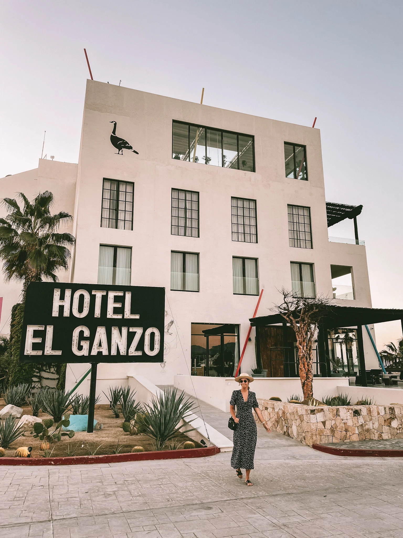 A woman walking out of Hotel El Ganzo in San Jose del Cabo