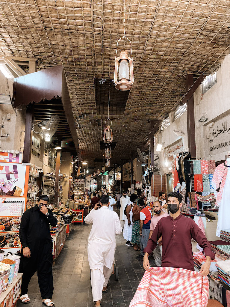 The Bar Dubai Souk with vendors and people walking along its alleys