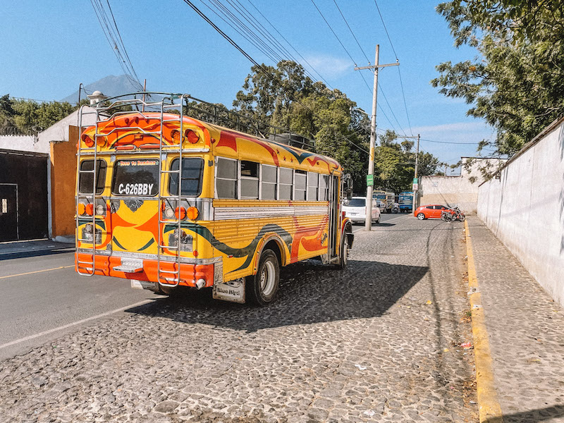 Image of a chicken bus in Antigua. I don't recommend traveling on chicken buses for long distances on your Guatemala itinerary, but definitely you should try one for a short route!