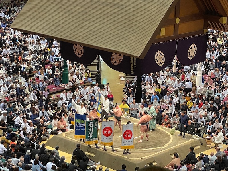 The stage of Sumo Wrestling, with two wrestlers getting ready for the fight