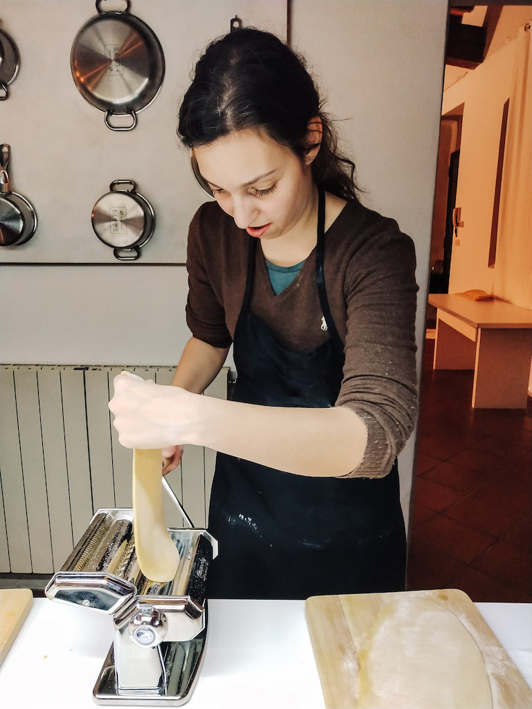 Image of a woman making fresh pasta 