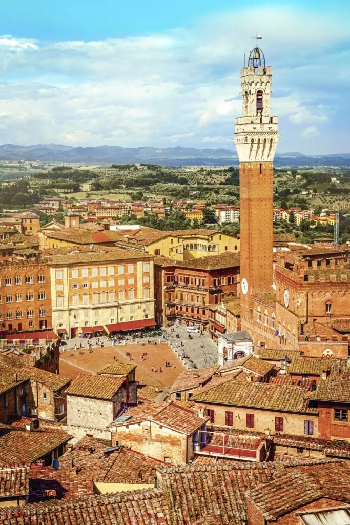 Image of the historic city of Siena, with its bell tower standing out