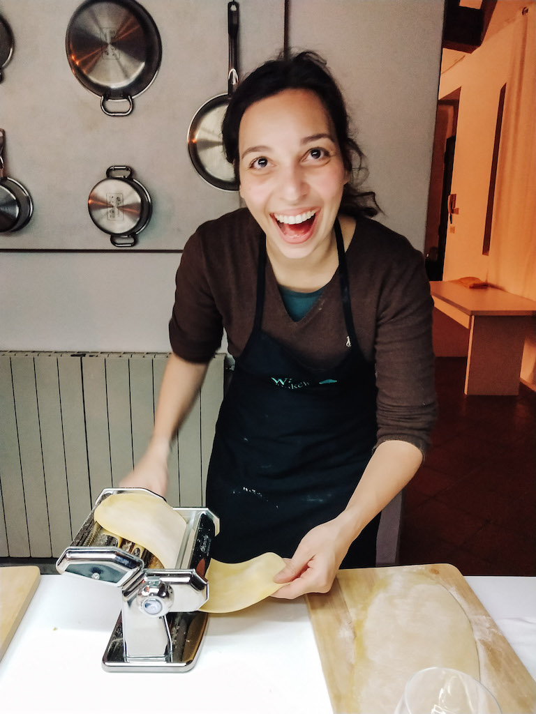 Image of a woman making fresh pasta 