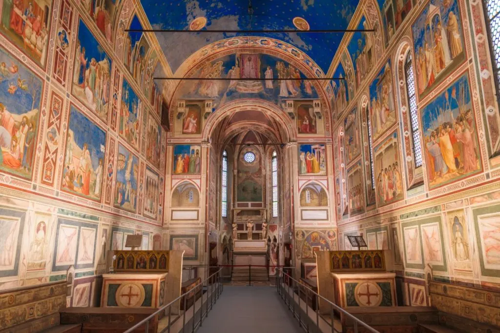 The interior of the Scrovegni Chapel, completely covered in 14th-century frescoes by Giotto