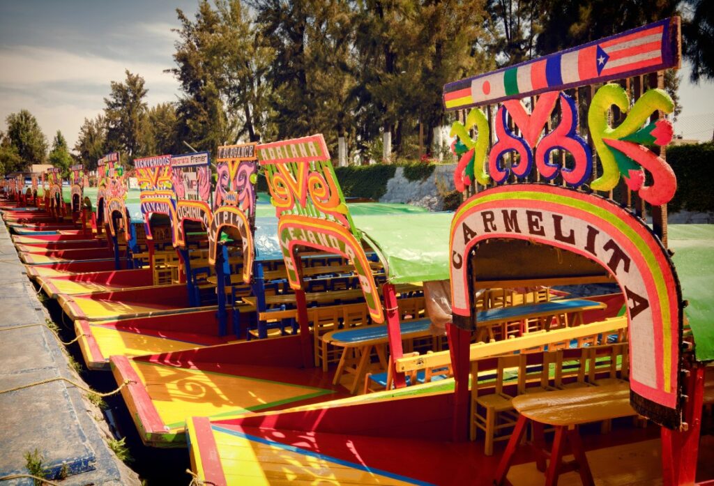 Colorful trajinera boats on the Xochimilco canals in Mexico City