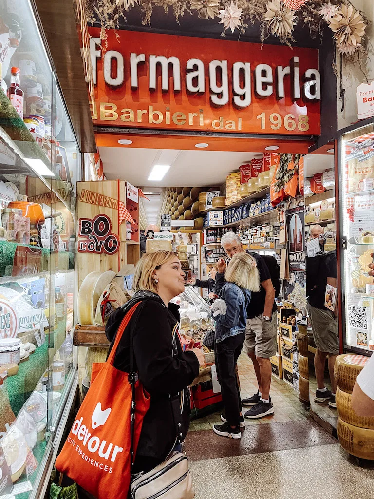 the entrance to a fromaggeria at a food market in Bologna