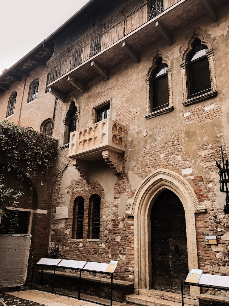 The patio from Juliet's House, with an archway entrance and Juliet's Balcony