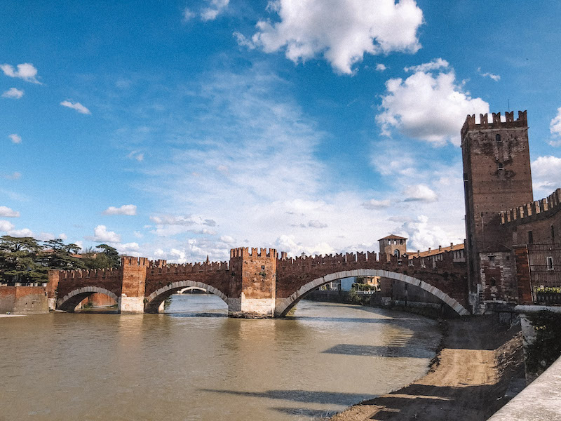 A bridge crossing the River Adige, with a tower of Verona's Castle, Castelvecchio, to the right