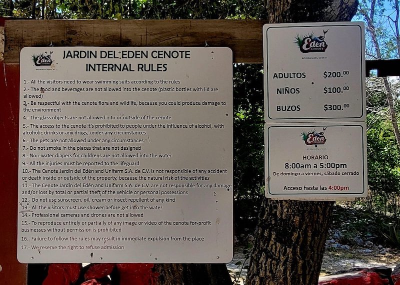 Image of three signs with the rules, entrance fees and opening hours of the cenote.