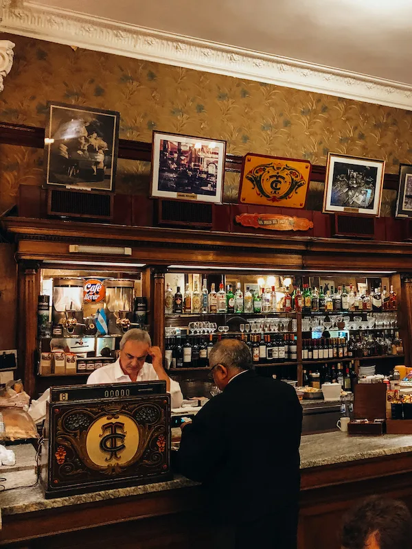 The counter of a traditional-looking coffee shop 