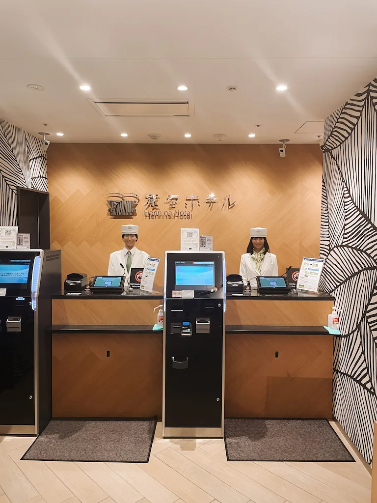 A hotel's reception with robots at the desks