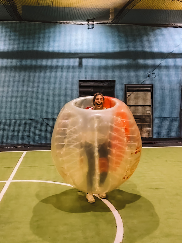 A woman inside a giant balloon 