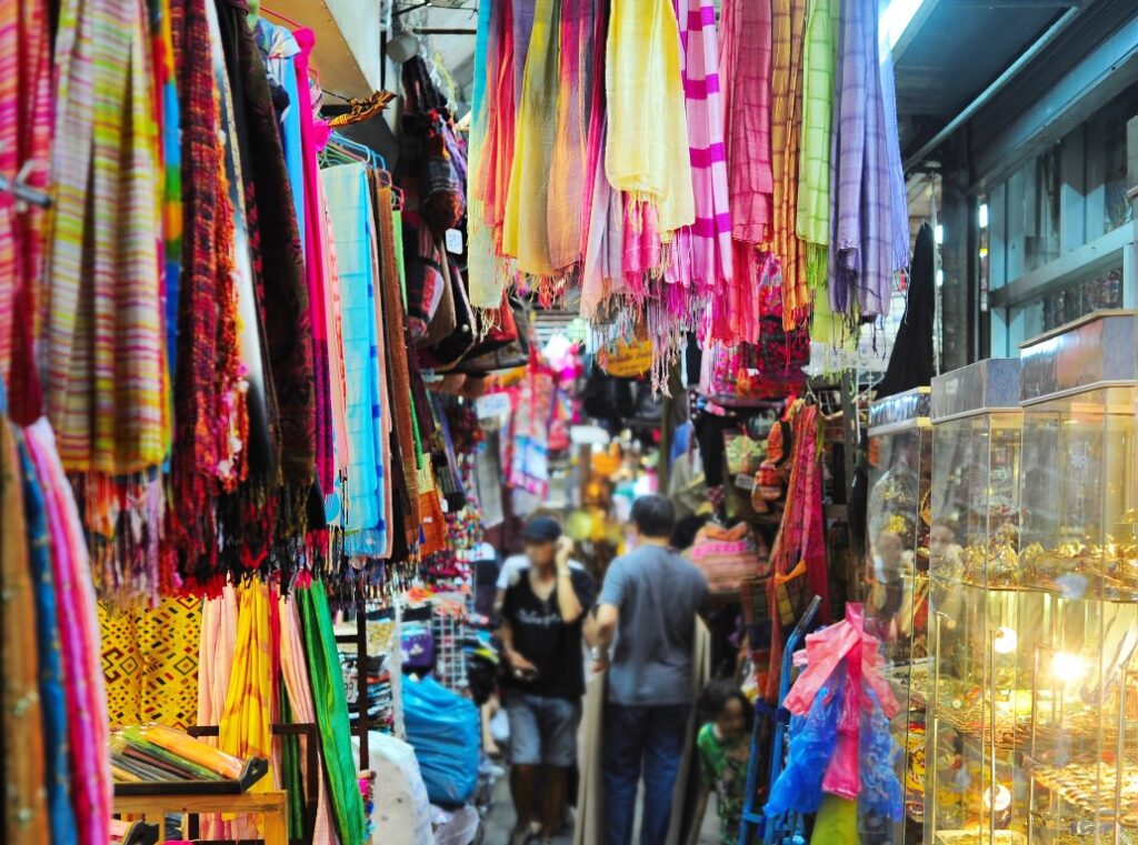 Colorful scarves hanging at a market