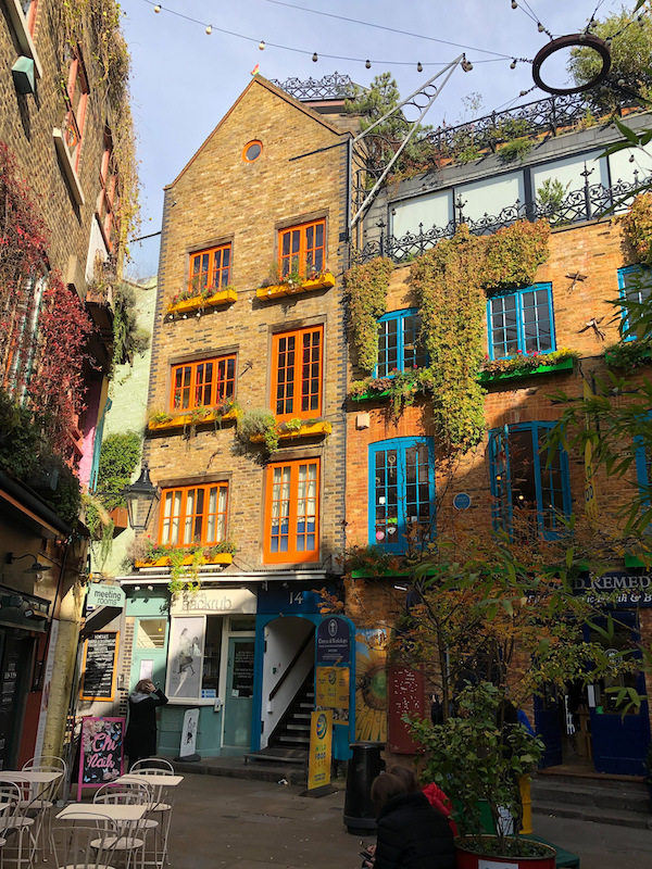 Brick buildings with colorful window frames